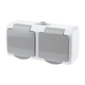 Изображение товара Розетка Intro Atlantic 5-204 2х2P+E Schuko шторки, 16А-250В, IP54, 2-местная, для открытой установки, с заземлением, IP54, цвет - серый