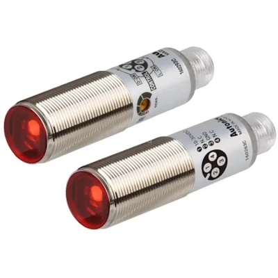 Датчик фотоэлектрический Autonics BRQM5M-TDTA-C на пересечение луча, NPN-выход с открытым коллектором, разъём М12, 10-30В, IP67, красный LED (660нм), расстояние срабатывания - 5м, положение датчика - фронтальное, материал корпуса - латунь