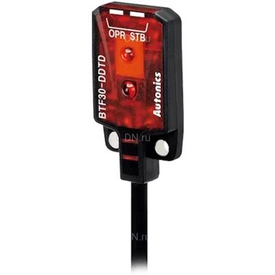 Датчик фотоэлектрический Autonics BTF30-DDTD диффузный NPN-выход с открытым коллектором, кабель диам. 2.5мм дл. 2м, 12-24В, IP67, красный LED (650нм), расстояние срабатывания - 30мм, на затемнение, материал корпуса - полибутилентерефталат